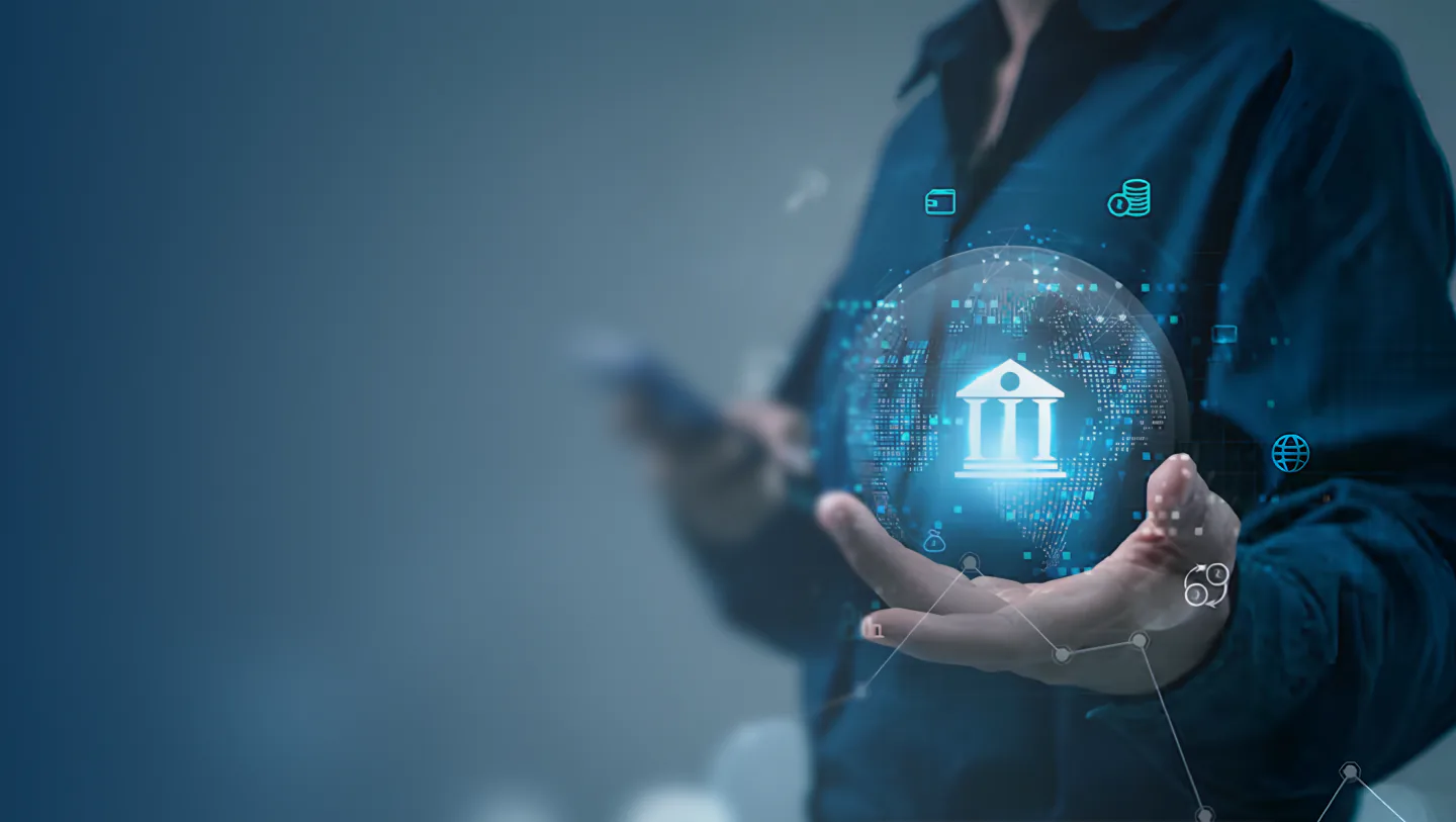 Hand holding a glowing digital globe with a bank icon