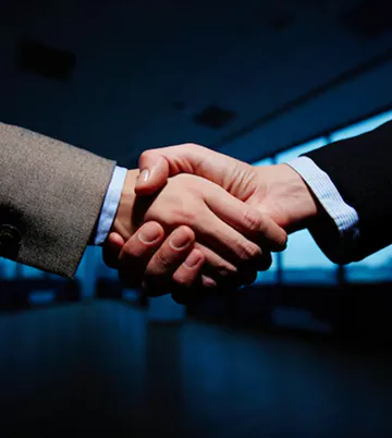 Two business partners shaking hands